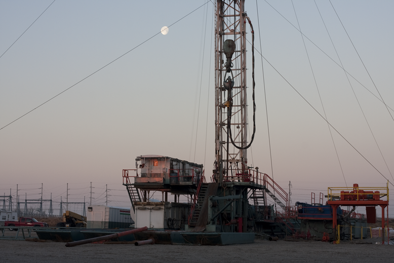 Early morning moon over rig.